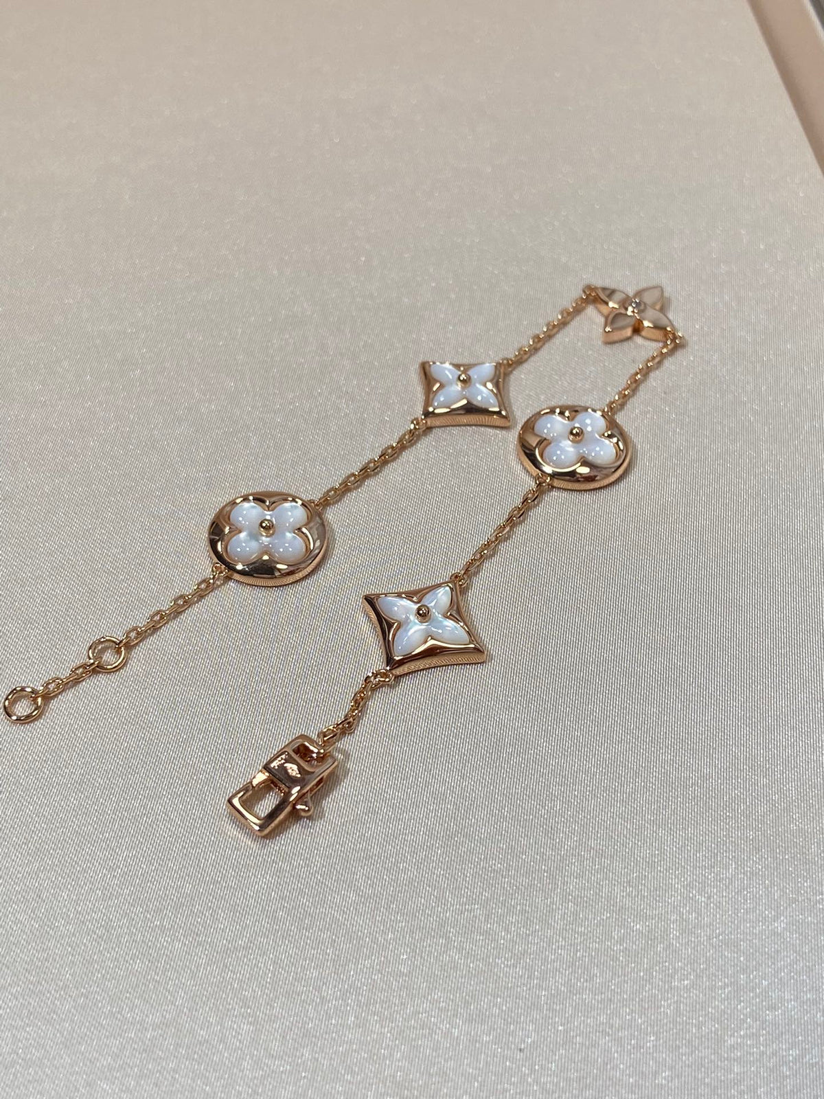 [Stellar Jewelry]STAR AND SUN 5 MOTIF MOP PINK GOLD BRACELET