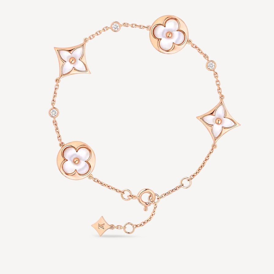 [Stellar Jewelry]STAR AND SUN 4 MOTIF WHITE MOP PINK GOLD BRACELET