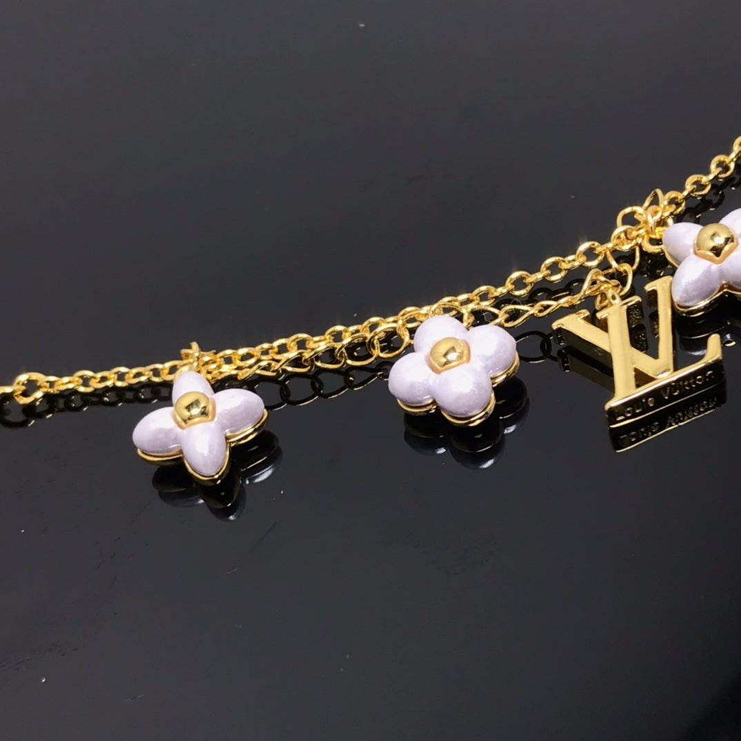 [Stellar Jewelry]LOGO 6 MOTIF STAR AND SUN GOLD BRACELET